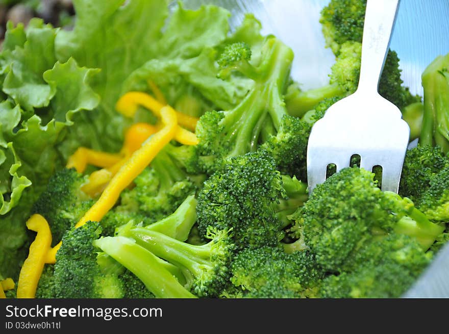 Traditional Organic Broccoli Salad with Fancy Garnish and Serving Utensil. Traditional Organic Broccoli Salad with Fancy Garnish and Serving Utensil