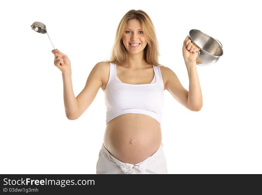 Happy pregnant woman with cooking utensils isolated on white