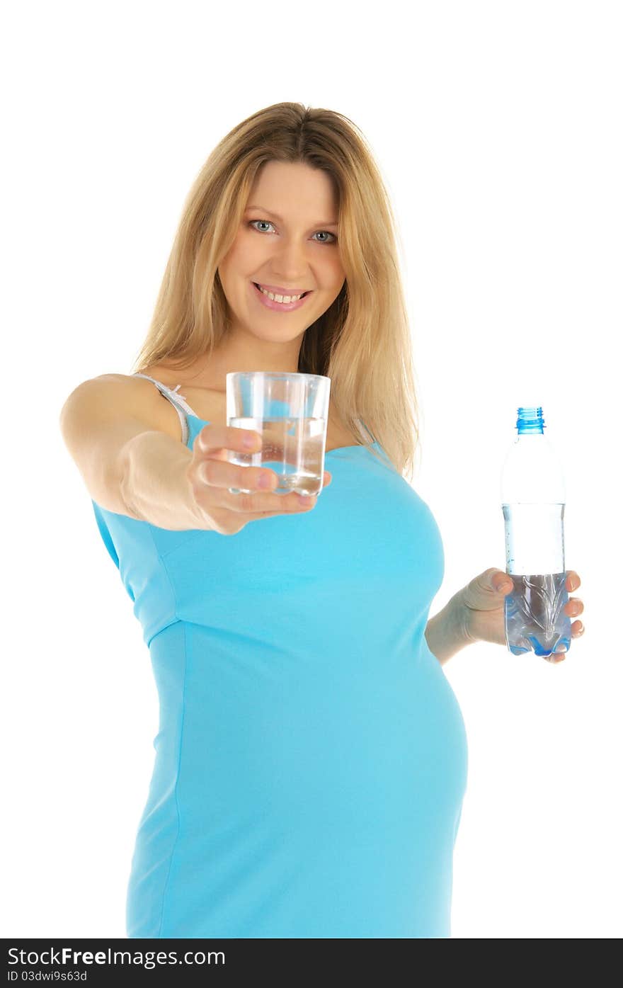 Pregnant woman holds out glass of water isolated on white