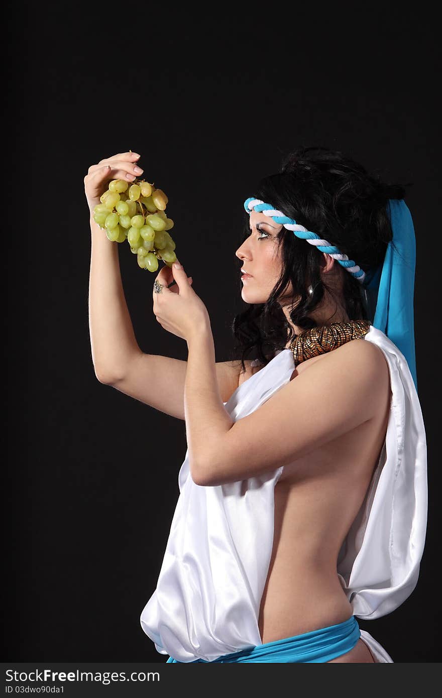 Ancient godness with a bunch of grapes. Ancient godness with a bunch of grapes