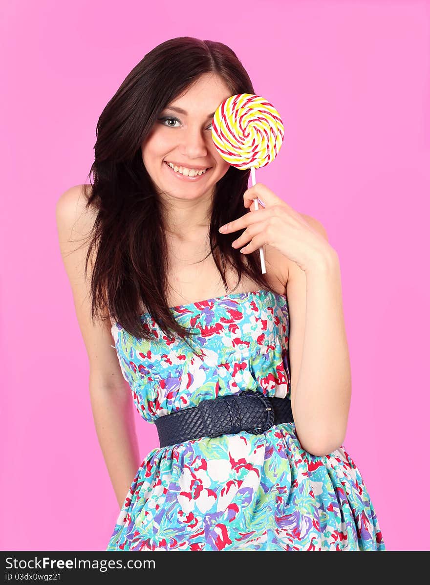 Glamorous Girl Wearing Colorful Dress With Lollipo