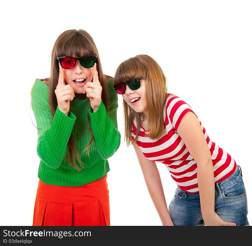 Sisters having fun while watching 3D movie isolated on white background