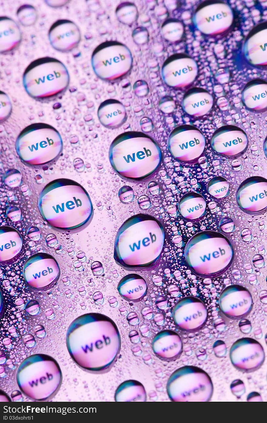 The word web in water drops. Close-up of studo shot.Internet symbols are very popular and they are recognisable all over the world. The word web in water drops. Close-up of studo shot.Internet symbols are very popular and they are recognisable all over the world.