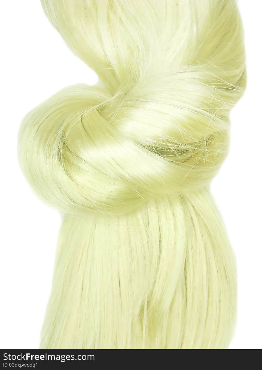 Shiny blond hair knot isolated on white background