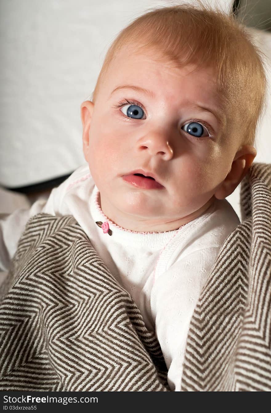 Closeup portrait of cute baby girl