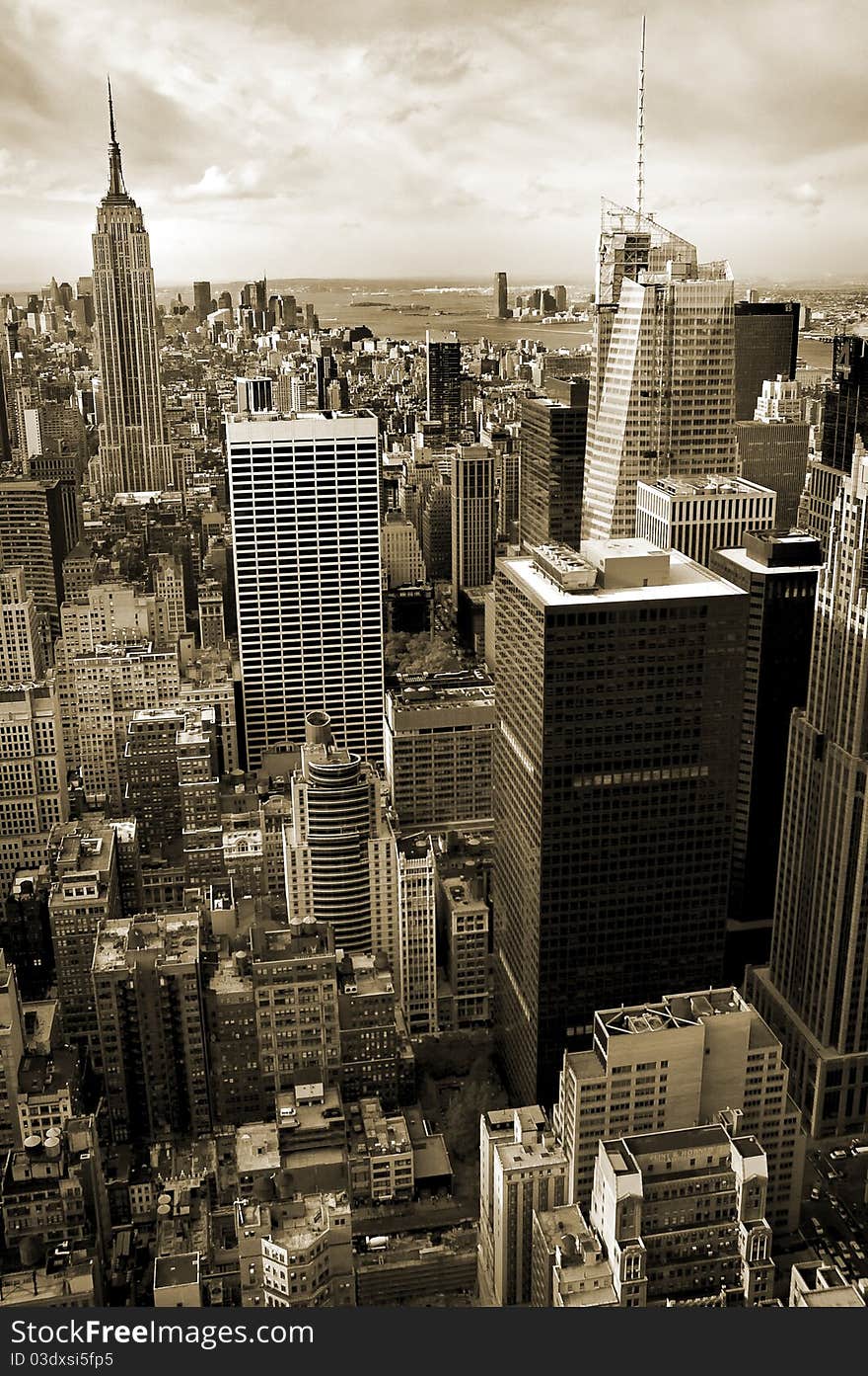 Vertical aerial photo of sepia colored Manhattan, Empire State Building in background. Vertical aerial photo of sepia colored Manhattan, Empire State Building in background