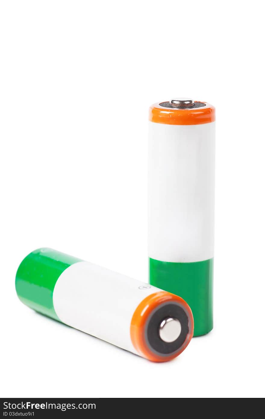 Two batteries isolated over white background