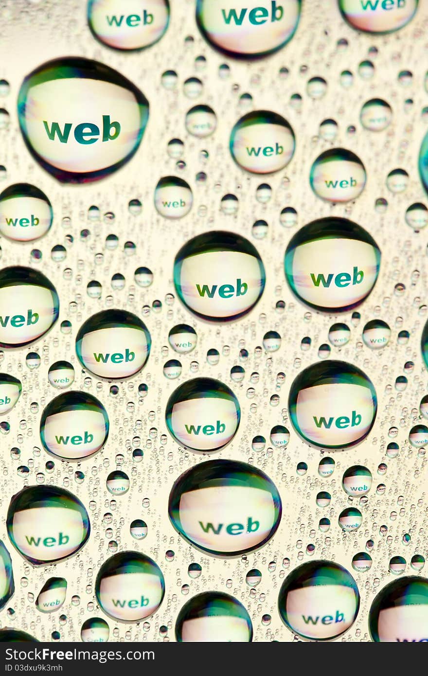 The word web in water drops. Close-up of studo shot.Internet symbols are very popular and they are recognisable all over the world. The word web in water drops. Close-up of studo shot.Internet symbols are very popular and they are recognisable all over the world.