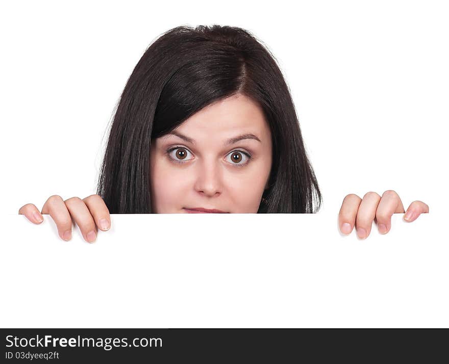 Portrait of a beautiful young woman with blank billboard on white background