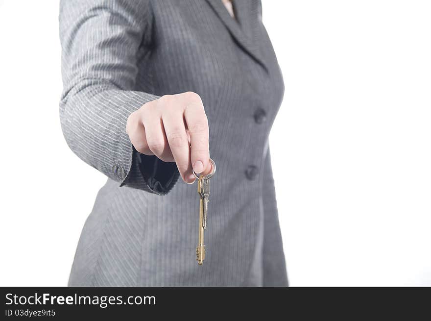 The young businesswoman hold the key in the hand. The young businesswoman hold the key in the hand