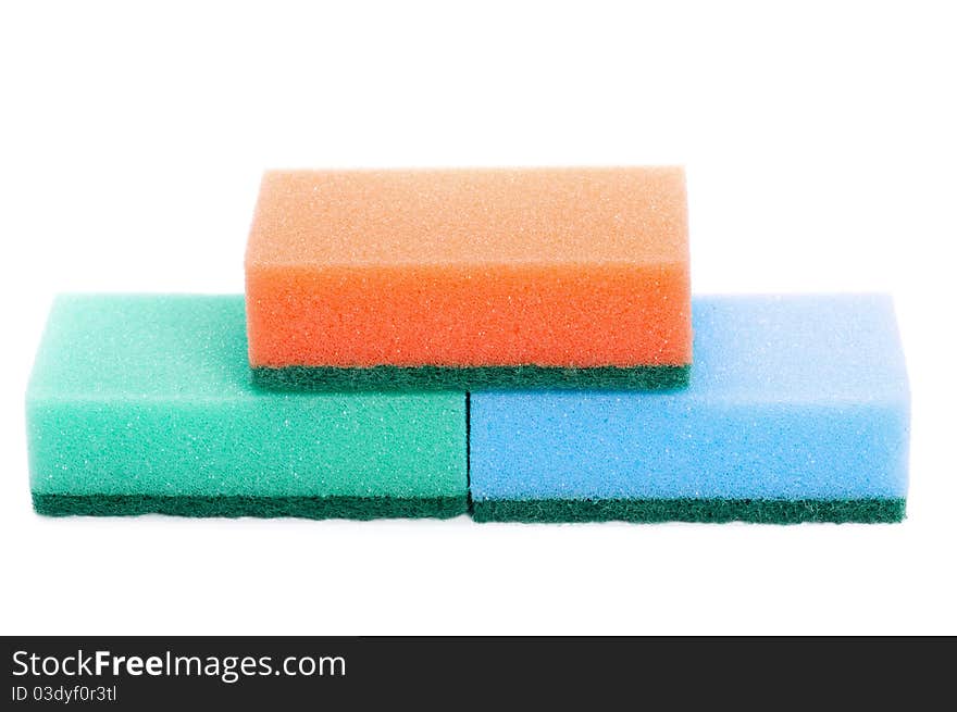 Three multi-colourful kitchen sponges for ware washing