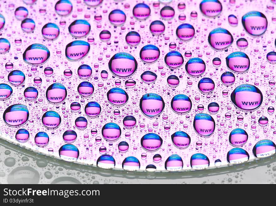 The word web in water drops. Close-up of studo shot.Internet symbols are very popular and they are recognisable all over the world. The word web in water drops. Close-up of studo shot.Internet symbols are very popular and they are recognisable all over the world.