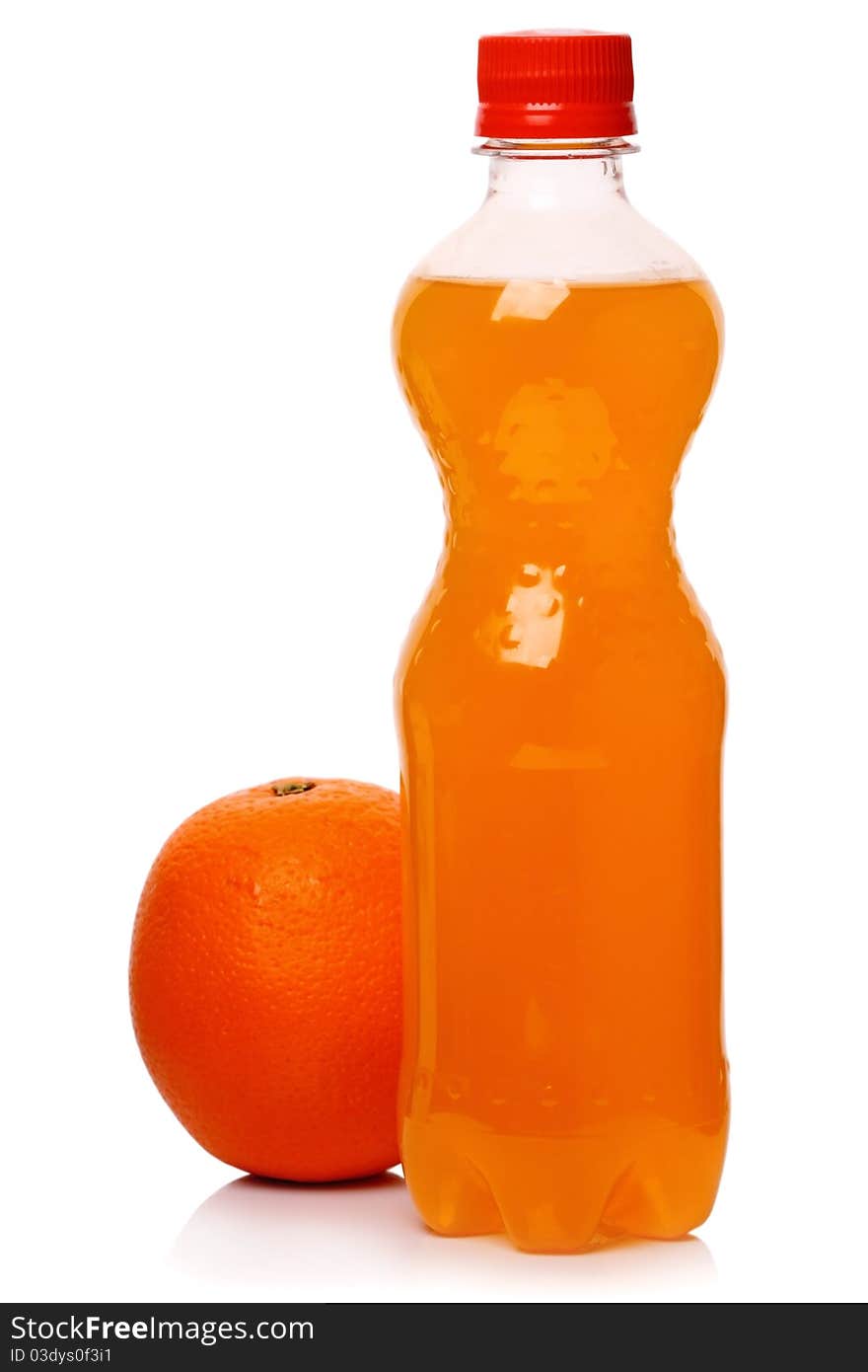 Bottle of soda and orange isolated on a white background