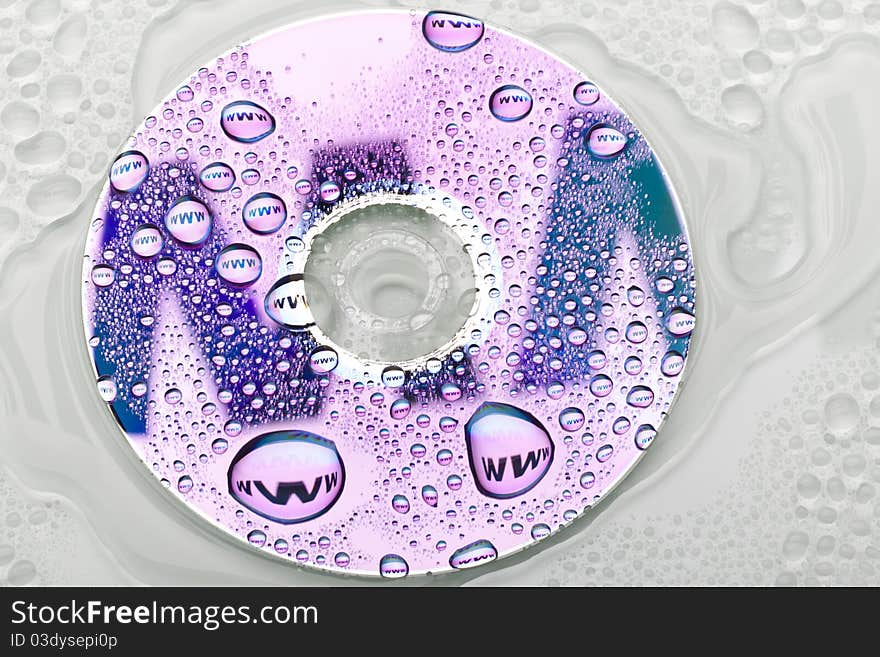 The word web in water drops. Close-up of studo shot.Internet symbols are very popular and they are recognisable all over the world. The word web in water drops. Close-up of studo shot.Internet symbols are very popular and they are recognisable all over the world.