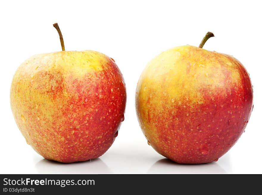 Two fresh apples isolated on a white background