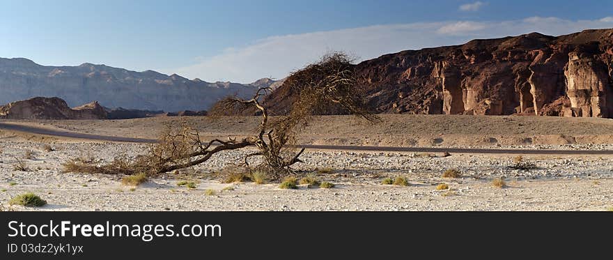 This shot was taken in Timna geological park of Israel; in the park pillars of Solomon are the famous geological formations in the desert of Negev. This shot was taken in Timna geological park of Israel; in the park pillars of Solomon are the famous geological formations in the desert of Negev