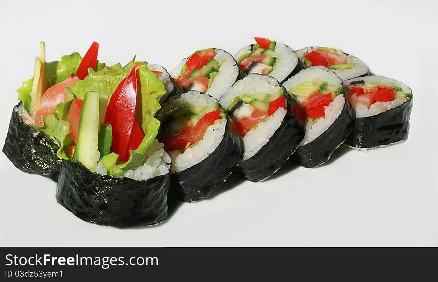 Tasty sushi set with fish and red pepper