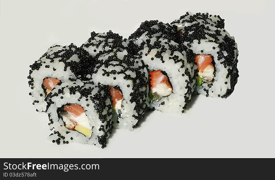 Tasty sushi set with fish and black caviar