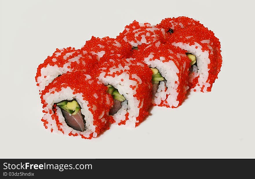 Tasty sushi set with fish, avocado and caviar. Tasty sushi set with fish, avocado and caviar