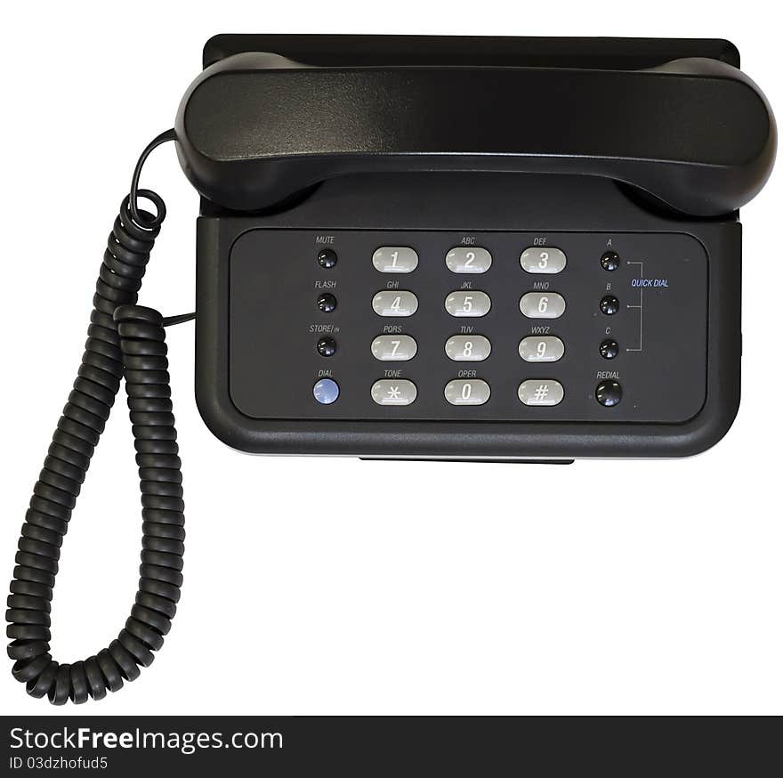 Black office telephone isolated on white background. Top view.