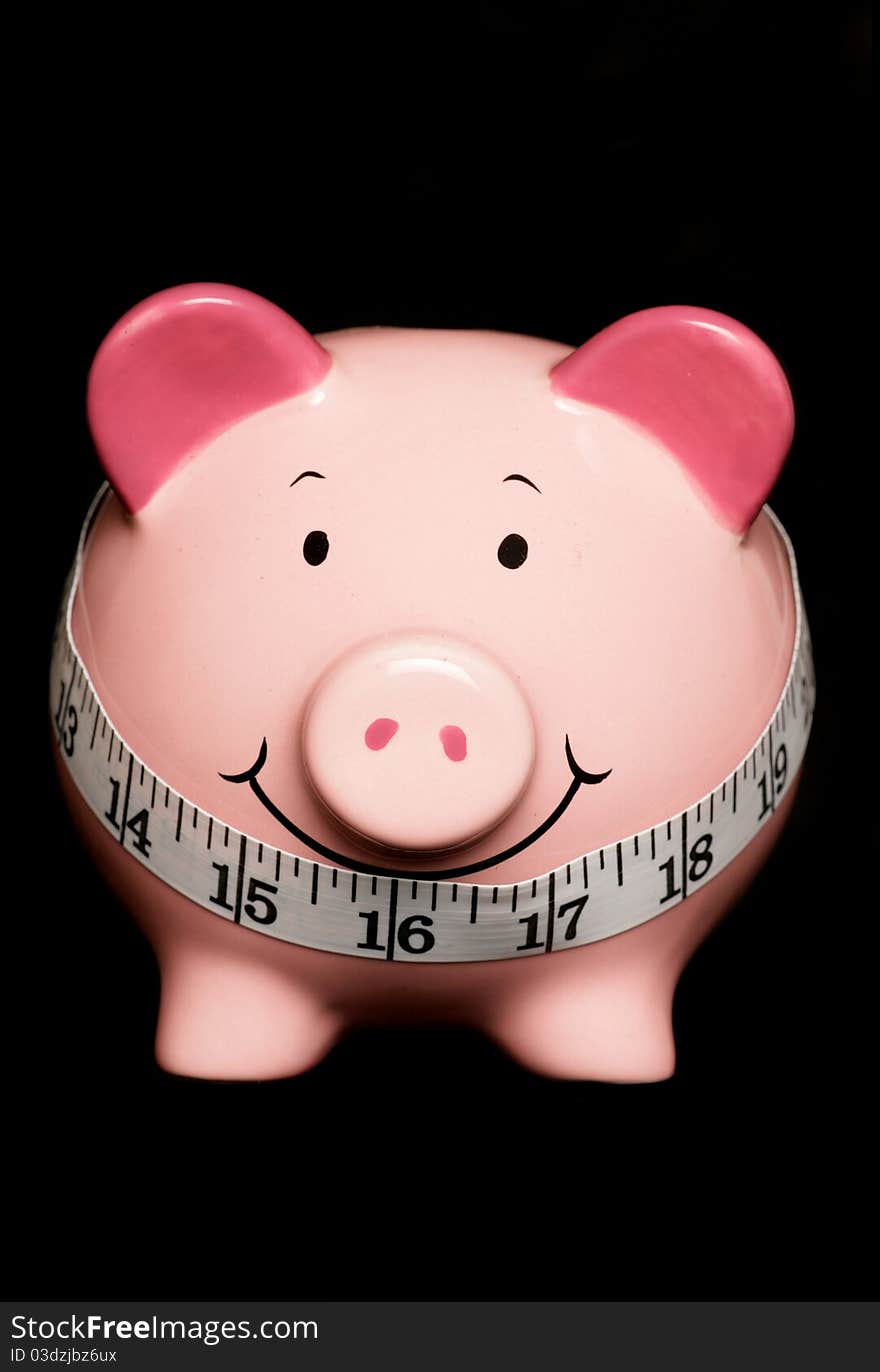 Piggy bank with tape measure