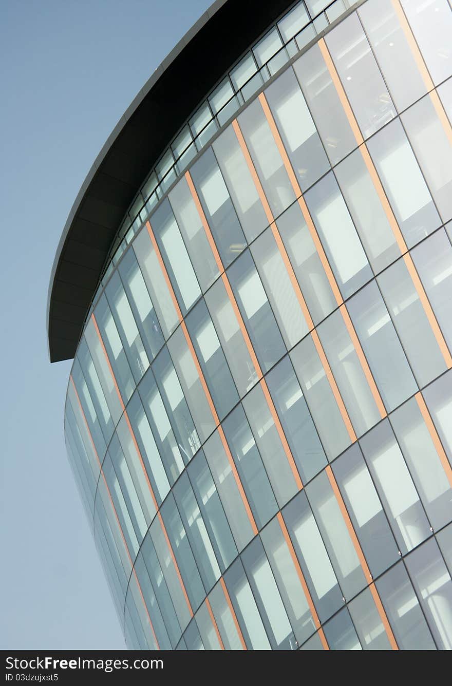 Modern curved office building in the financial district of Glasgow, Scotland. Modern curved office building in the financial district of Glasgow, Scotland.