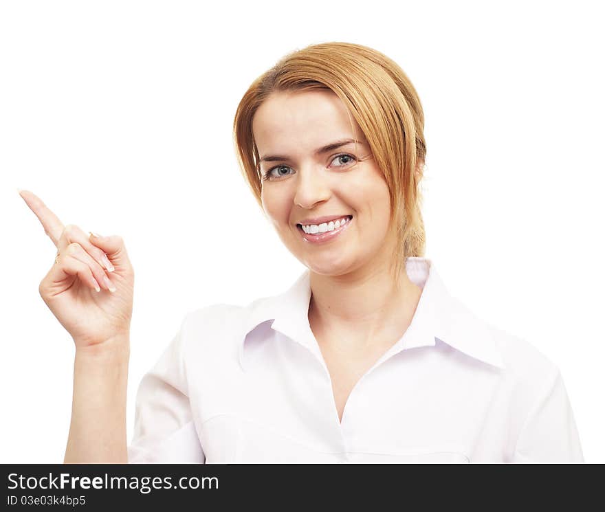 Young woman smiling and pointing to up