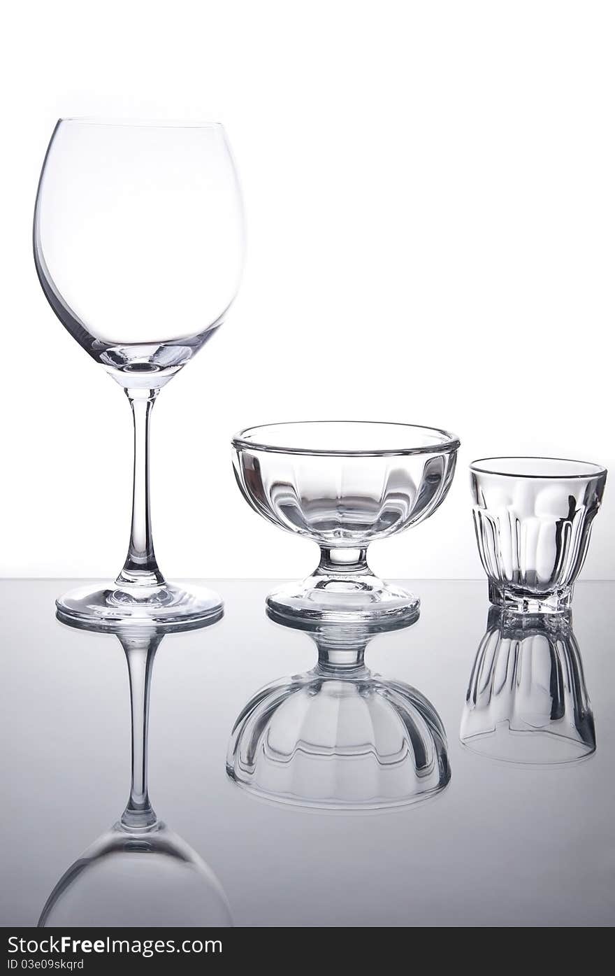 Empty wine glass and cocktail glass as white isolate background. Empty wine glass and cocktail glass as white isolate background