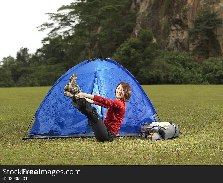 Asian Female Camper Doing Yoga Outdoors