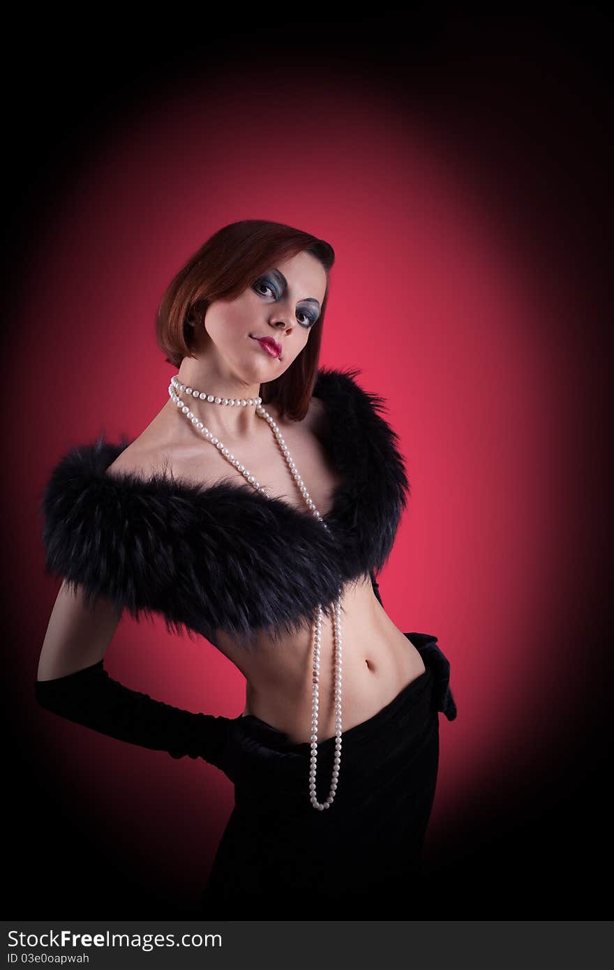 Woman portrait with fur boa in retro style