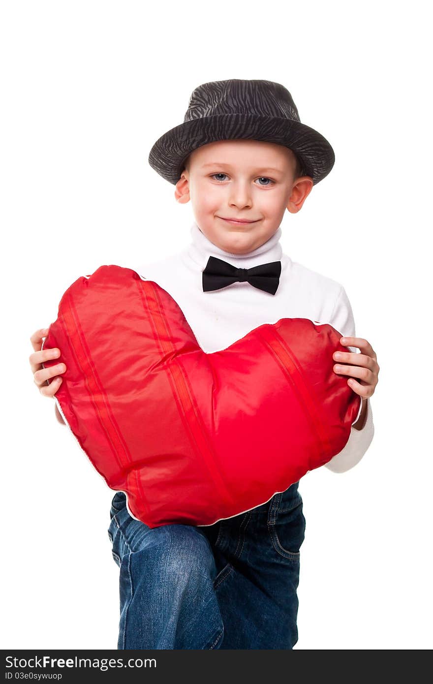 Cute boy with red heart isolated on white