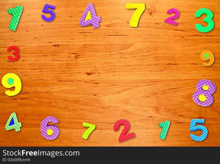 Colorful frame number on wood table