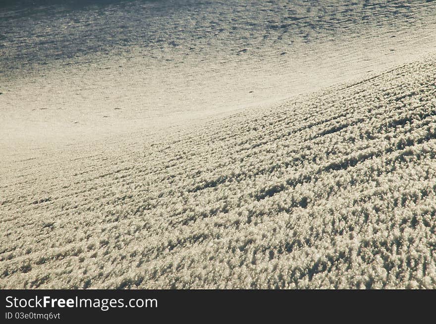 Snow background with beautiful ice crystals