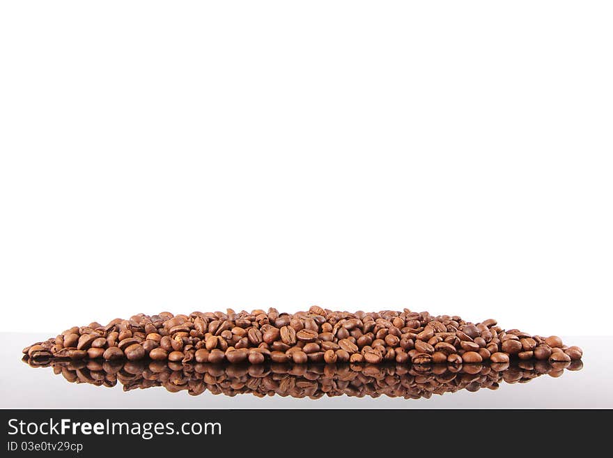 Coffee Beans background, reflected on black glass