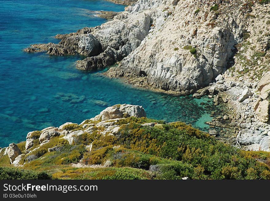 Rocky coastline with turquoise water in Corsica, France. Rocky coastline with turquoise water in Corsica, France