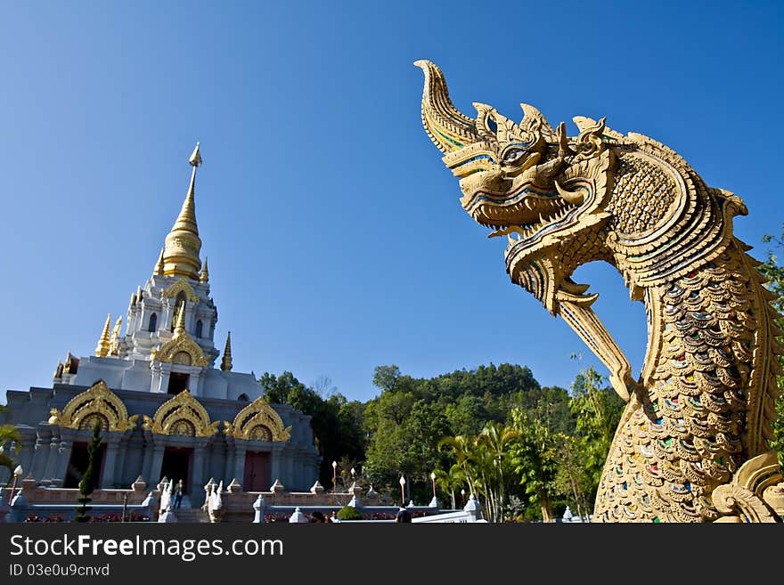 Great Naga Statue Look toward the Pagoda, Chiang Rai, Thailand. Great Naga Statue Look toward the Pagoda, Chiang Rai, Thailand.