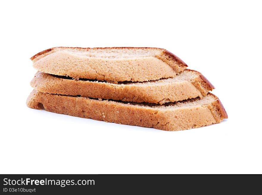 Close up shot of sliced bread on white background