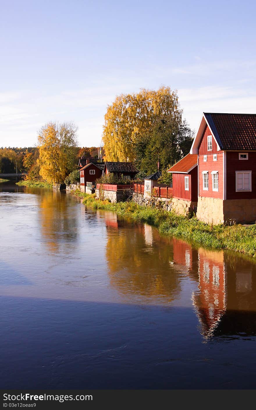 Idyllic swedish village at riverside.