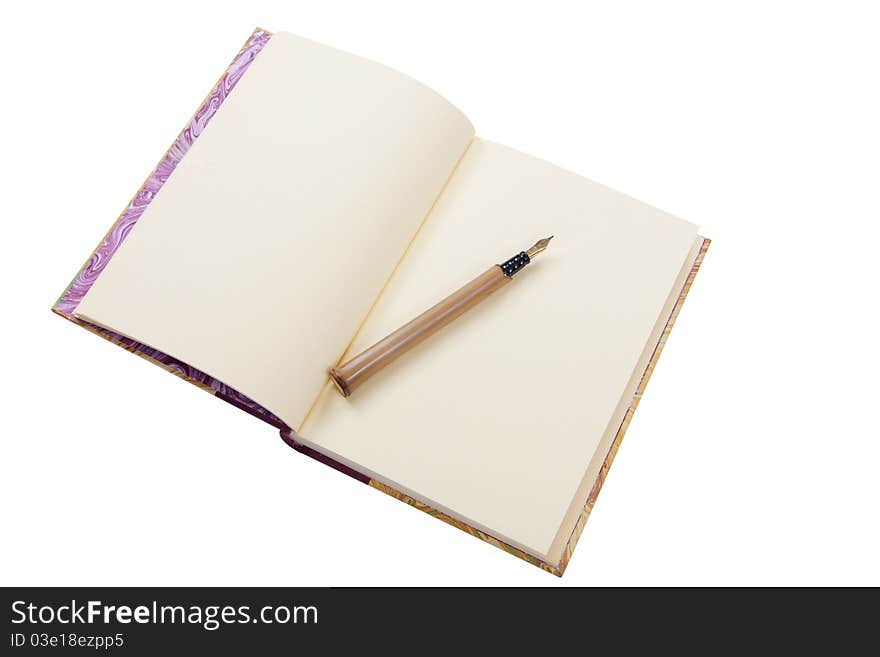 Blank pages of a book with a reed pen. Blank pages of a book with a reed pen