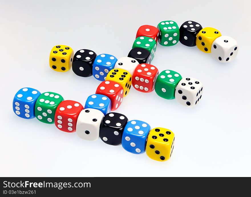 Dice in shape of pound sterling symbol