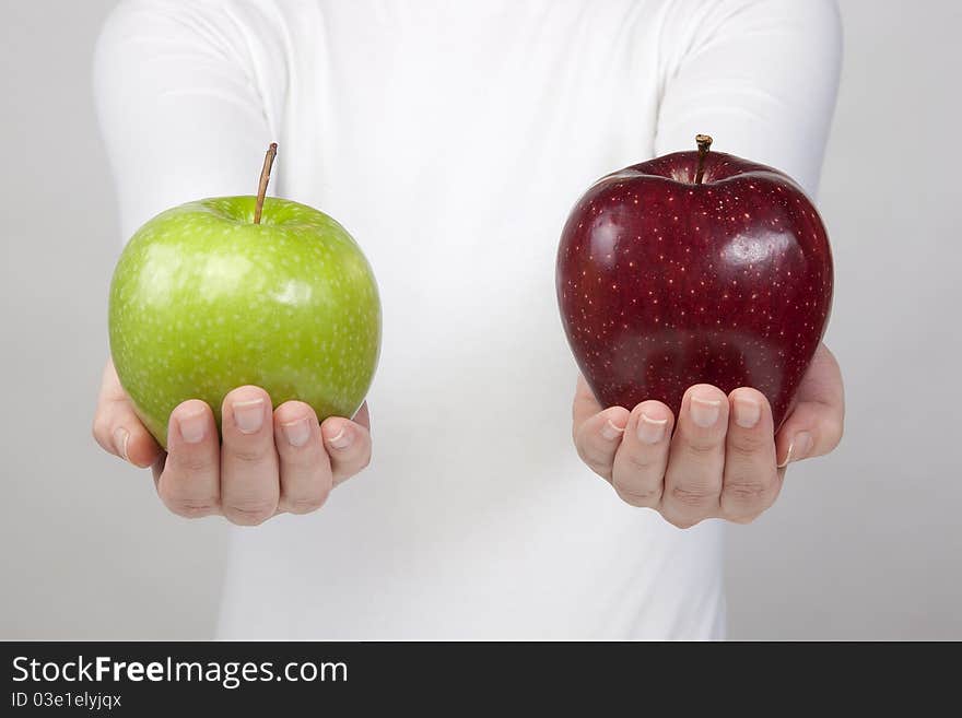 Woman holding two apple