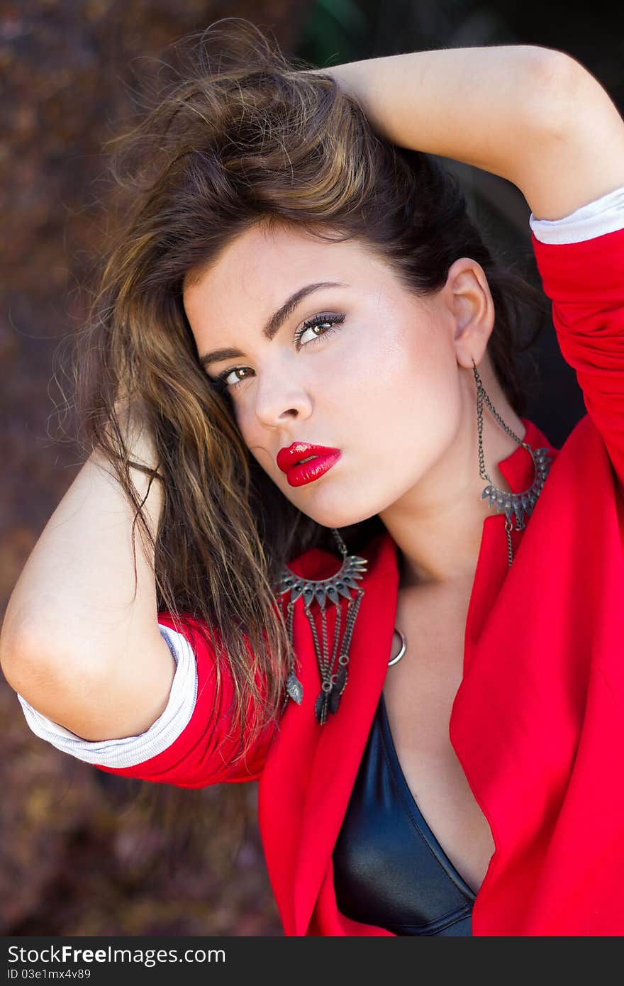 Bright portrait of a beautiful lady wearing red. Bright portrait of a beautiful lady wearing red