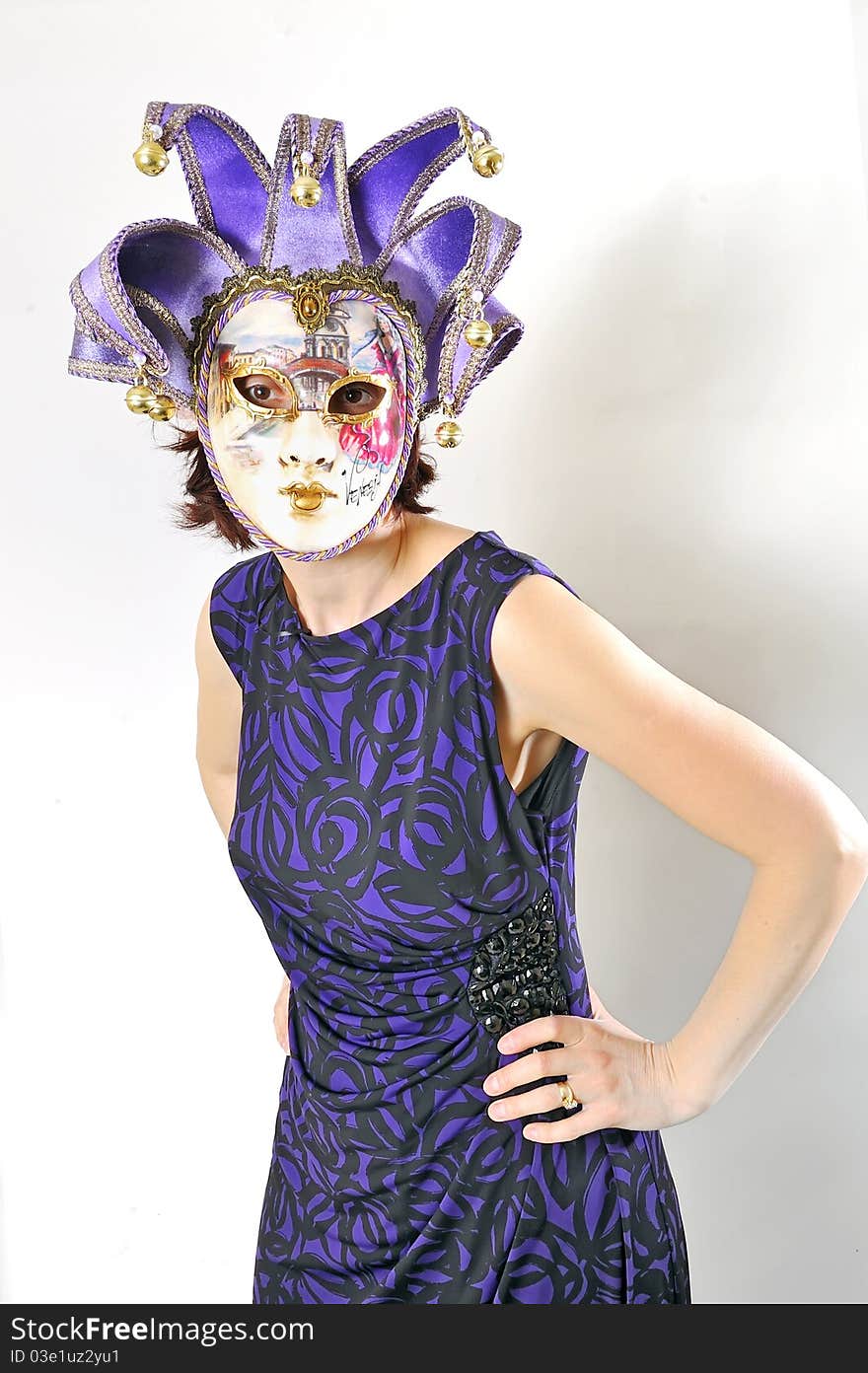 Girl in a Venetian mask isolated