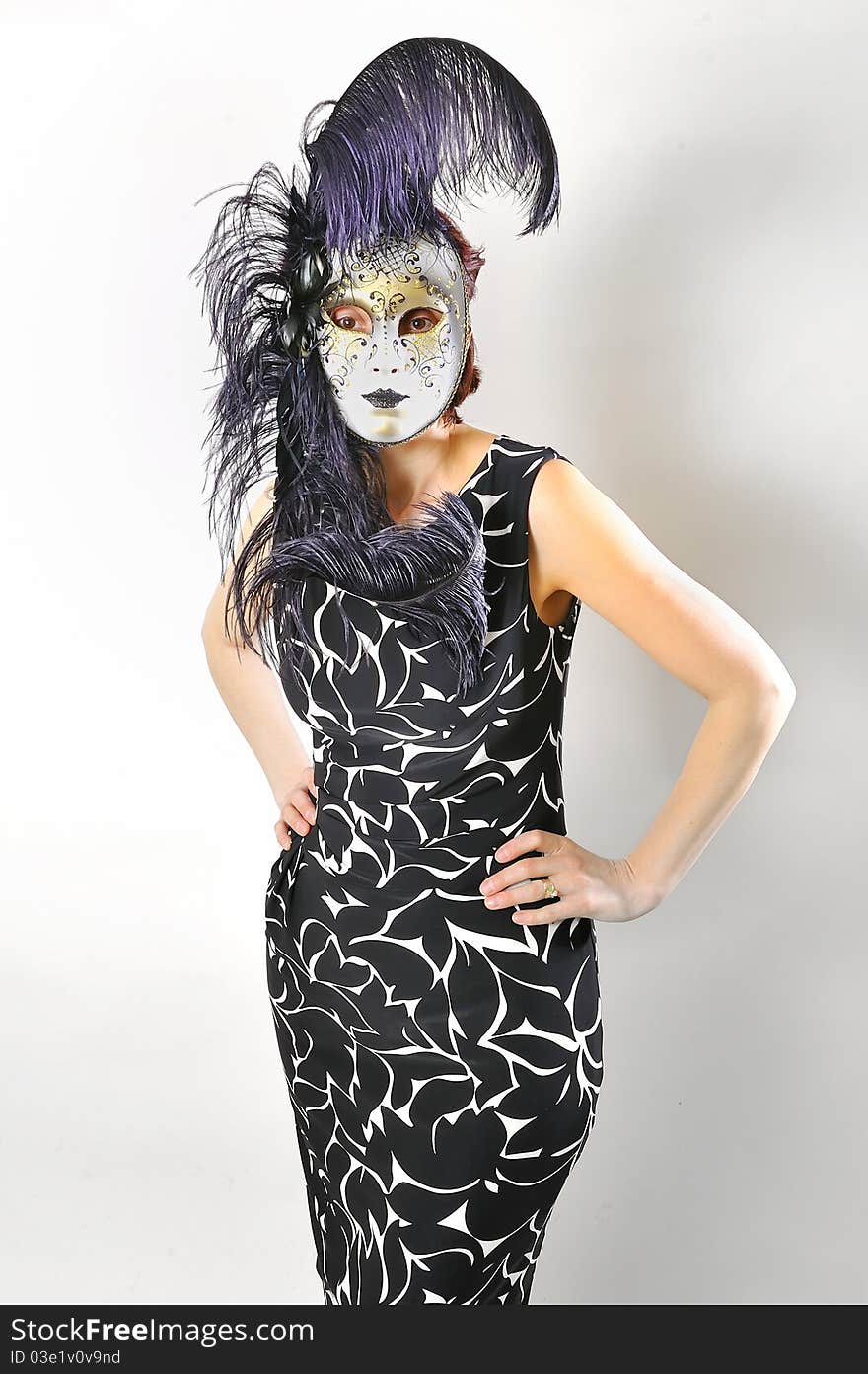 Girl in a Venetian mask isolated