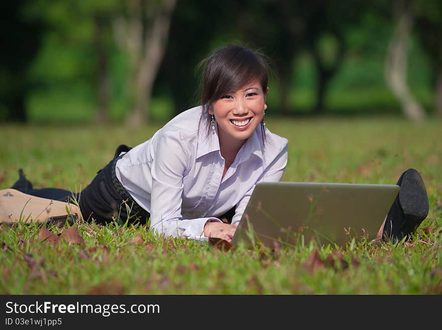 Business Woman Using Laptop Outdoor