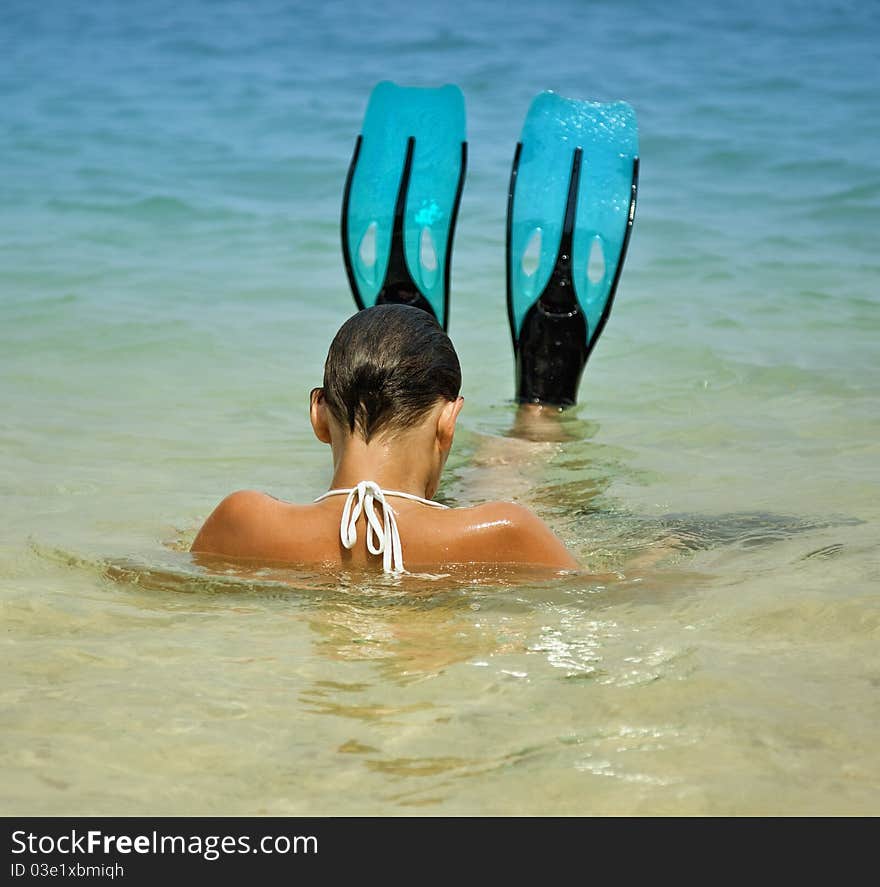 Flippers upswimming woman outdoor photo