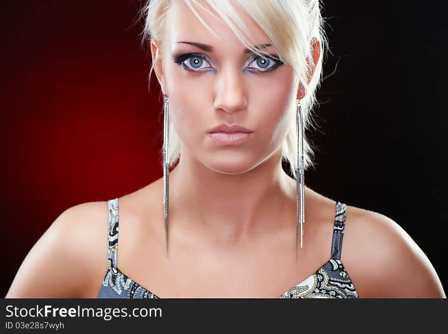 Closeup portrait of an elegant blonde beauty, studio shot