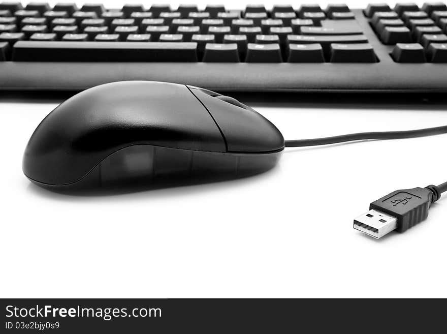 Keyboard and mouse on a white background