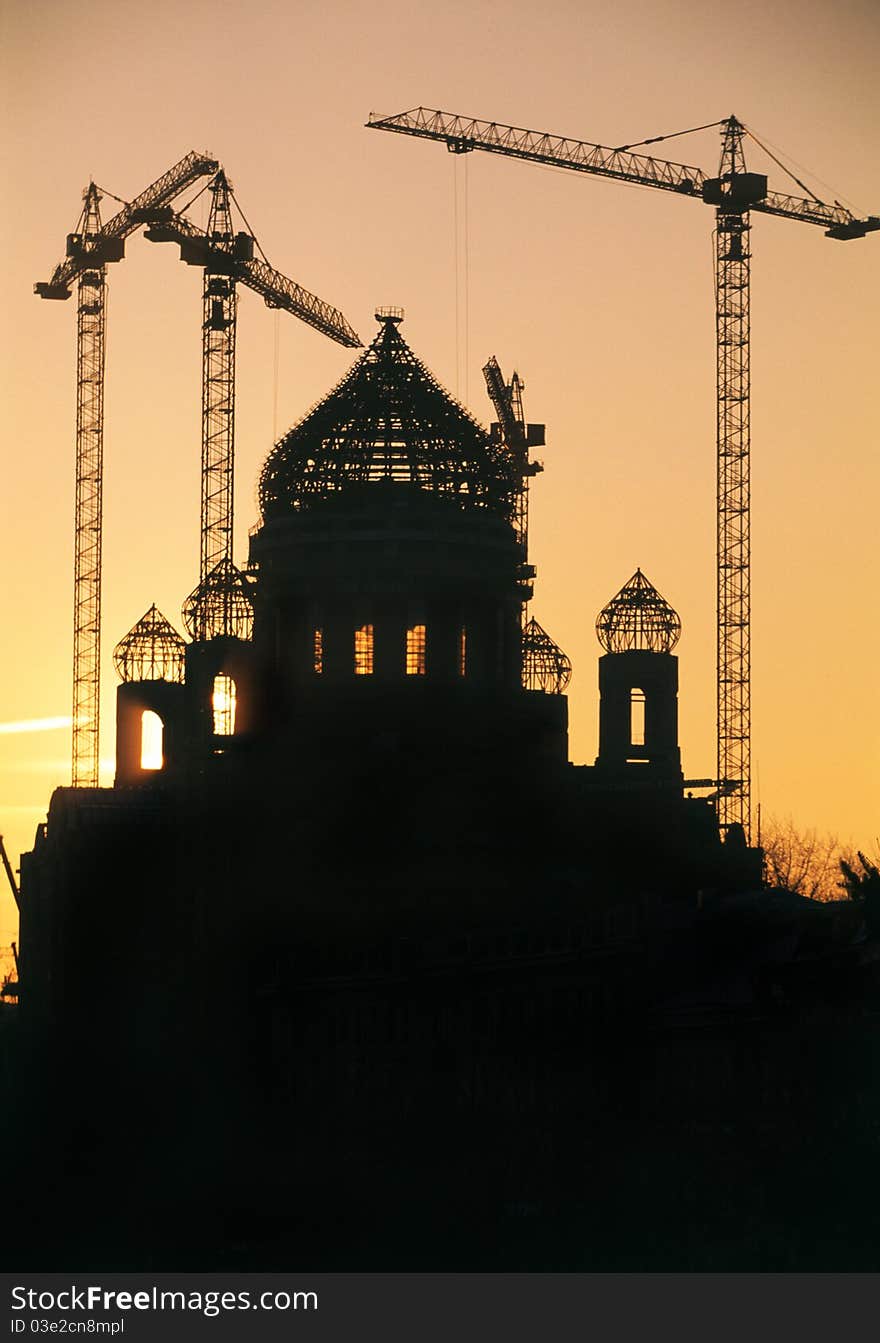 Building Cranes And Christian Cathedral