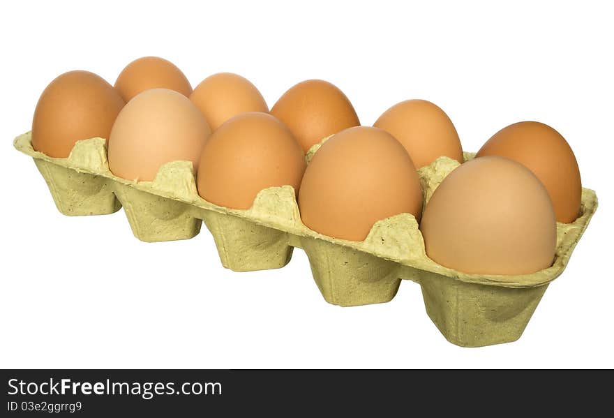 A carton of ten eggs isolated on white background. Clipping path included. A carton of ten eggs isolated on white background. Clipping path included.